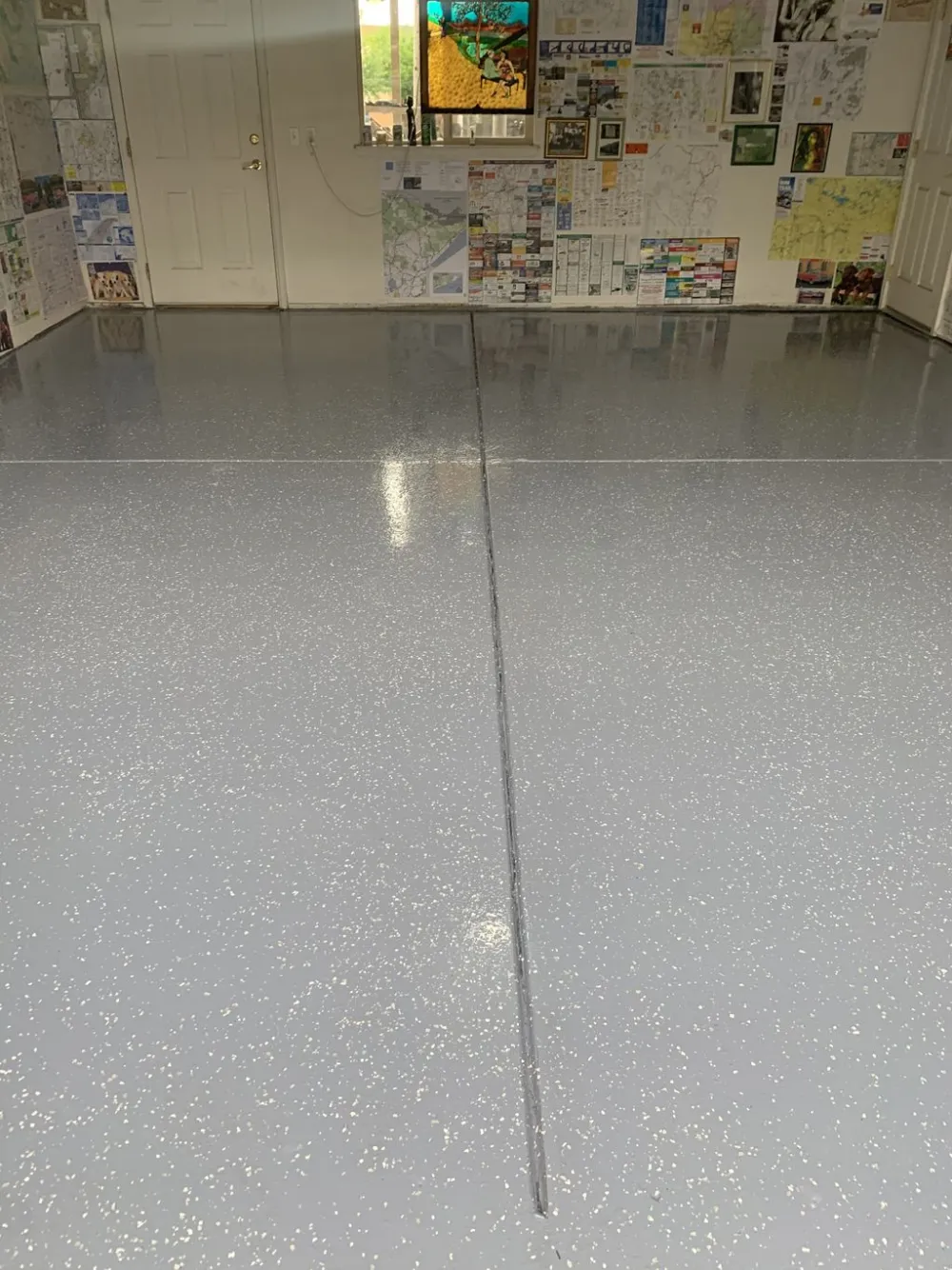 Gray flake floor with a polyaspartic clear coat in a Denver garage